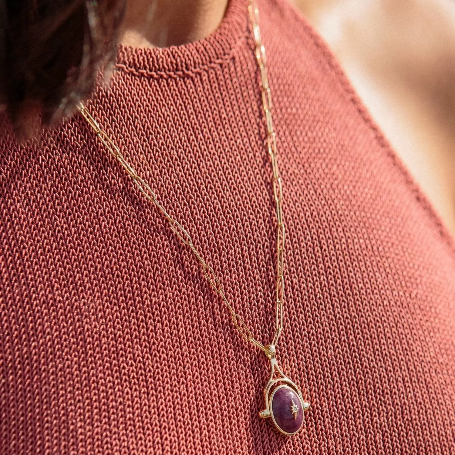 Oval Cabochon Ruby Spinning Pendant with Star Overlay